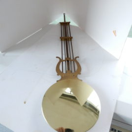 Compositie slinger glimmende schijf  lengte 42 cm
